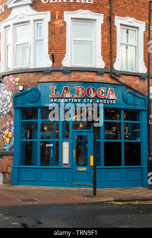 Doncaster, UK - May 11 2019: Flower graffiti mural decorates the exterior of La Boca restaurant & steakhouse, 1 Netherhall Road Stock Photo