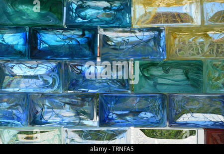 Blue Yellow and Green  Coloured Glass Bricks  Background Stock Photo