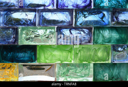 Blue Yellow and Green  Coloured Glass Bricks  Background Stock Photo