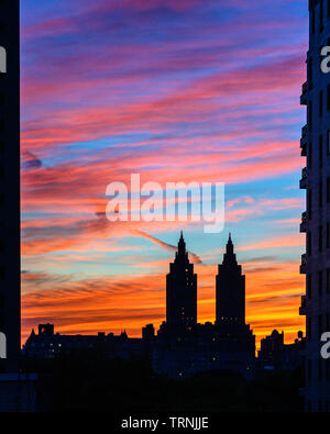 New York, USA,  8 June 2019. Sunset over the iconic towers of the San Remo apartment building in New York City.   Credit: Enrique Shore/Alamy Stock Ph Stock Photo
