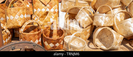 Baskets are made by hand from bast. Stock Photo