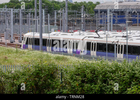 Picture shows Crossrail's new Bombardier Class 345 trains  sitting in sidings at Old Oak Common,London last week.The trains were meant to be running now but delays in the new line means they might not be used until 2021.  New aerial pictures show dozens of Crossrail's new high-tech trains sitting idle in a London depot waiting to be used.  The trains are part of a £1 billion fleet commissioned for the flagship rail project, which is believed to be costing around £17.6 billion.  Crossrail bought 70 trains, which each have room for 1,500 passengers, but only 15 of them are currently in use on ex Stock Photo