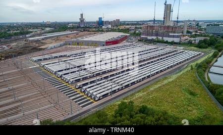 Picture shows Crossrail's new Bombardier Class 345 trains  sitting in sidings at Old Oak Common,London last week.The trains were meant to be running now but delays in the new line means they might not be used until 2021.  New aerial pictures show dozens of Crossrail's new high-tech trains sitting idle in a London depot waiting to be used.  The trains are part of a £1 billion fleet commissioned for the flagship rail project, which is believed to be costing around £17.6 billion.  Crossrail bought 70 trains, which each have room for 1,500 passengers, but only 15 of them are currently in use on ex Stock Photo