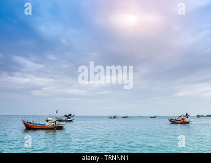 Small Fishing Boats coastal drift after returning from fishing Stock Photo