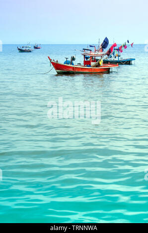 Small Fishing Boats coastal drift after returning from fishing Stock Photo