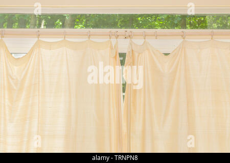 Yellow curtain with frame for background and texture. - Image Stock Photo