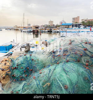 Fishing nets in Tyre harbour, Tyre, Lebanon Stock Photo