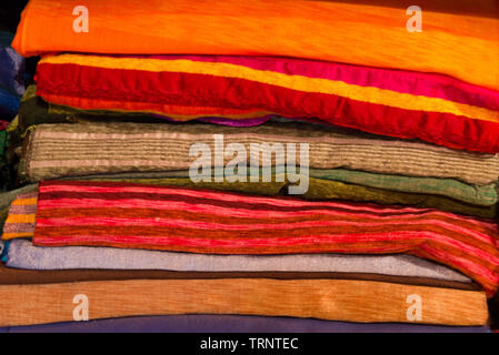 carpets, scarfs and blankets piled in a moroccan textile shop Stock ...