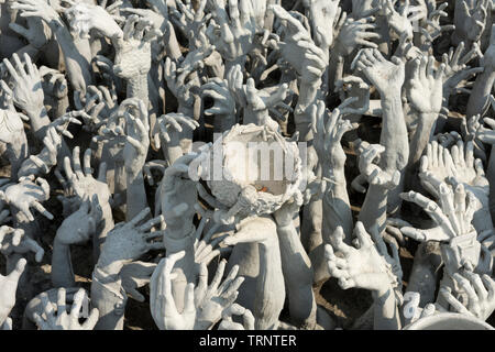 Hands of Hell Sculpure at Wat Rong Khun (White Temple), Chiang Rai, North Thailand Stock Photo