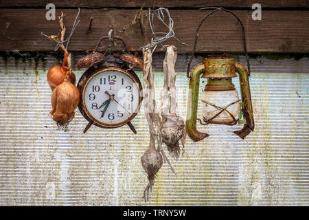 Rusty Broken Clock Dirty old broken rusty alarm clock. Broken dial. Red body violet ...