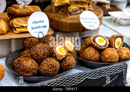 Street food stall with scotch eggs (Finest Fayre Scotch Eggs)  at Maltby Street Market, London, UK Stock Photo