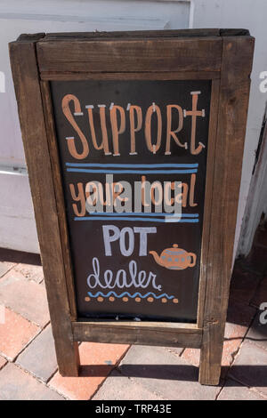 'Support your local pot dealer,' sign for tea shop in Old Town, Albuquerque, New Mexico Stock Photo