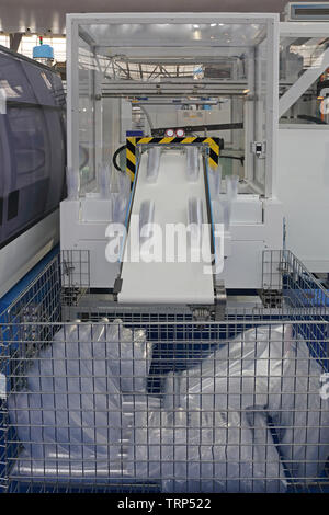 Production of Plastic Cups Manufacturing in Factory Stock Photo