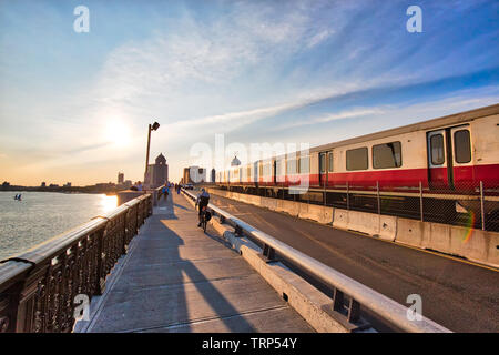 Boston, MA, USA-20 October, 2018: Boston MBTA subway lines, train crossing Longfellow bridge over scenic Charles river Stock Photo