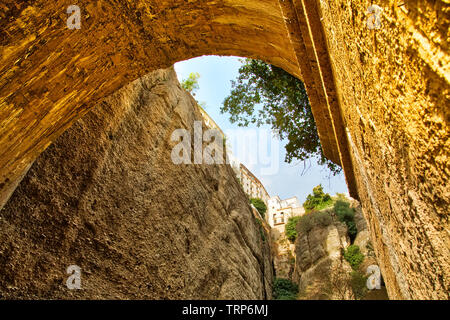 Famous Puente Nuevo Bridge's Arch in Ronda historic city center Stock Photo