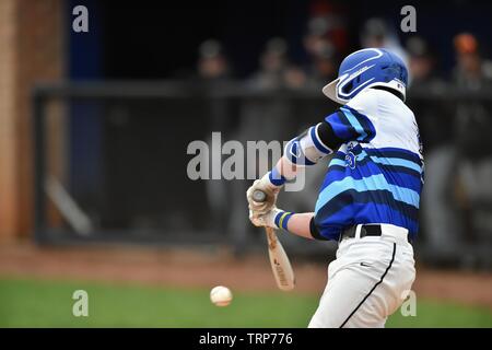 Hitter making solid contact on a pitch. USA. Stock Photo