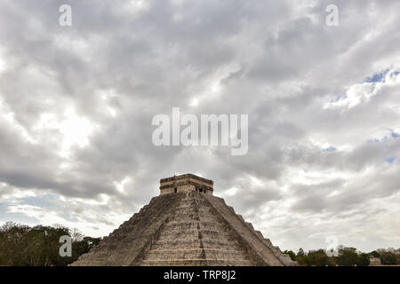 Temple of Kukulkan - a Mesoamerican step-pyramid that is the main tourist attraction at the Chichen Itza archaeological site in Yucatan, Mexico. Stock Photo