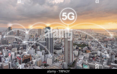 Network connection technology in the city sunset, with 5g internet networking sign Stock Photo