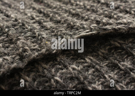 highly detailed needlework wool fabric, close up wool texture background Stock Photo