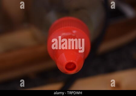 Open top on a plastic seasoning bottle Stock Photo