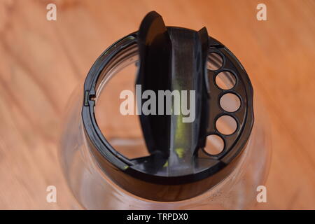 Open top on a plastic seasoning bottle Stock Photo