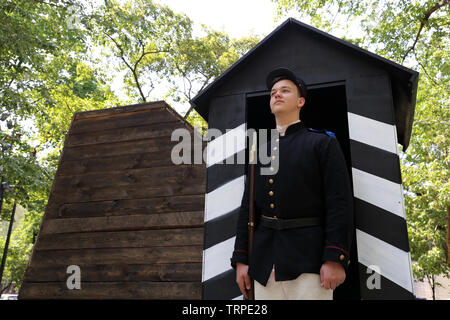 Man in a uniform of Russian Empire soldier of the 19th century during the Moscow historical festival Times and Epochs Stock Photo