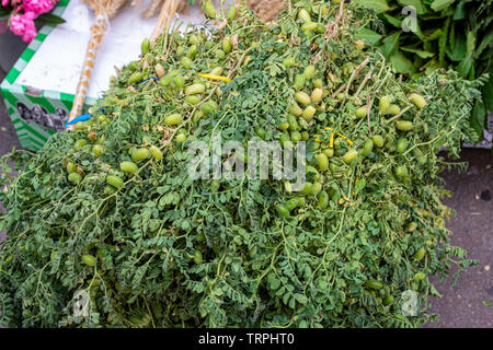 Fresh chickpeas branches on the market Stock Photo