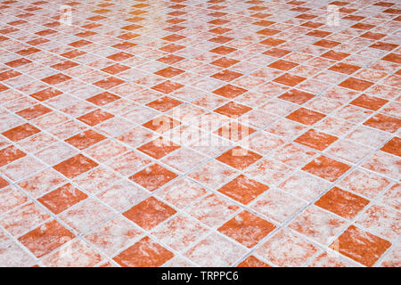 Floor table orange ceramic tiled flat background Stock Photo