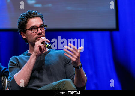 Bonn, Germany - June 8 2019: Steven Strait (*1986, American actor and model - The Expanse) talks about his experiences in The Expanse at FedCon 28 Stock Photo