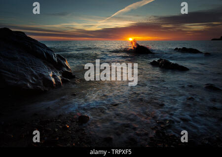 Sunset at Widemouth bay in Cornwall, England, UK Stock Photo