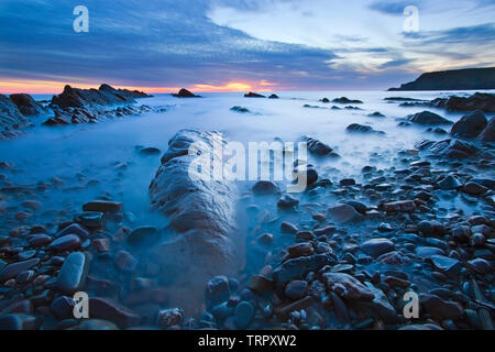 Sunset at Widemouth bay in Cornwall.England,UK Stock Photo