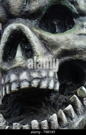 black color big skull sculpture closeup view Stock Photo