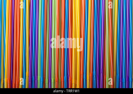 background of colorful cocktail tubes, straw for drinks, concept accessories to celebrate your party Stock Photo