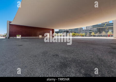 Lisbon, Portugal. Plaza under the canopy of Pavilhao de Portugal or Portuguese Pavilion. Parque das Nacoes or Park of Nations. By Alvaro Siza Vieira Stock Photo