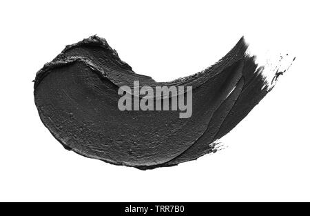 Texture of black crushed eyeliner or black acrylic paint isolated on white background Stock Photo