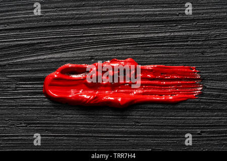 Texture of black crushed eyeliner or black acrylic paint isolated on white background Stock Photo