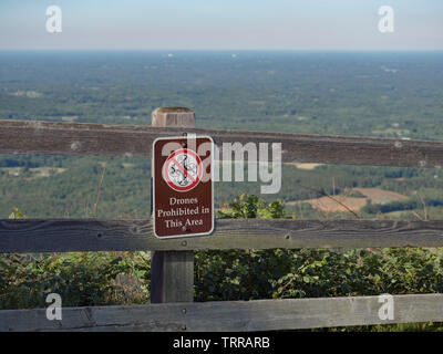 Drones Prohibited sign on fence in North Carolina state park. Pilot Mountain State Park, NC. Drone regulation. Stock Photo