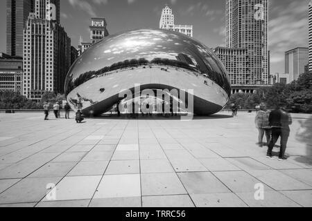 Cloud Gate, nicknamed 'Bean,' is located on Michigan Avenue within the cities Millennium Park, which features art, music, and theater to the public. Stock Photo