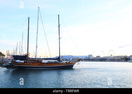 Sunset on the stylish port in Malaga city, on the Costa del Sol, in Andalucia, in Spain, Europe Stock Photo