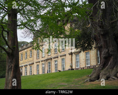 Cannon Hall through the trees. Georgian manor house in Barnsley, UK Stock Photo