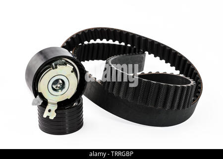 Spare parts for the car. The set of timing belt with rollers on a white background. Stock Photo
