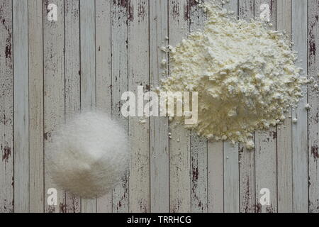 Wooden surface with flour and sugar Stock Photo