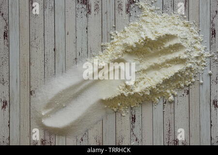 Wooden surface with flour and sugar Stock Photo