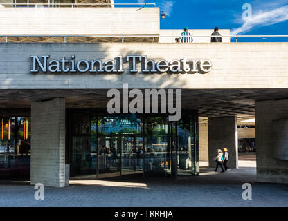 London, England, UK - May 31, 2019: People walk on the concrete terraces of the National Theatre in London's South Bank neighbourhood. Stock Photo