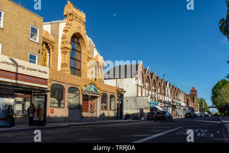 London, England, UK - May 14, 2019: Evening sun lights up the Murugan Hindu Temple in Highgate Hill in North London. Stock Photo