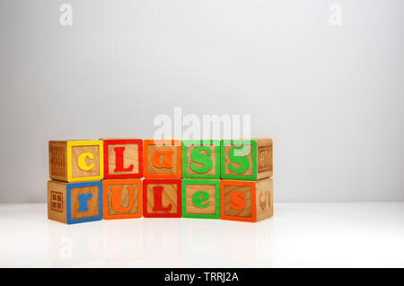 Stylized shot of “Class Rules” spelled out with ABC blocks. Stock Photo