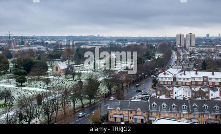 London, England, UK - December 5, 2012: Winter frost and snow lies in the Lambeth Cemetery on Blackshaw Road in Tooting. Stock Photo