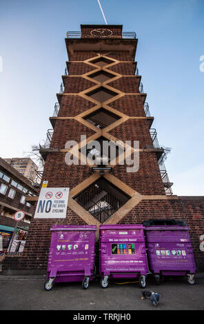 London, England, UK - December 10, 2011: The modernist brick clock tower at Chrisp Street market square in Poplar, East London. Stock Photo