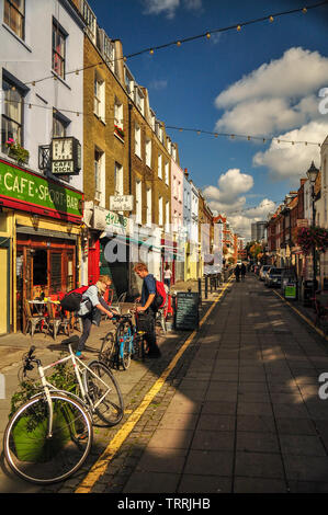 London, England, UK - September 18, 2011: Sun shines on the independent shops and cafes of Exmouth Market in central London. Stock Photo