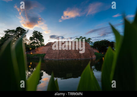 Chiang Mai ancient city wall and moats in sunset sky Stock Photo